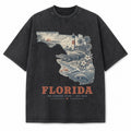 Vintage Washed Florida Coastal Graphic Tee in Black, front view on a white background
