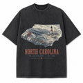 Vintage Washed North Carolina Coastal Graphic Tee in Black, front view on a white background