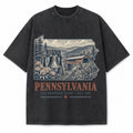 Vintage Washed Pennsylvania Liberty Bell Graphic Tee in Black, front view on a white background